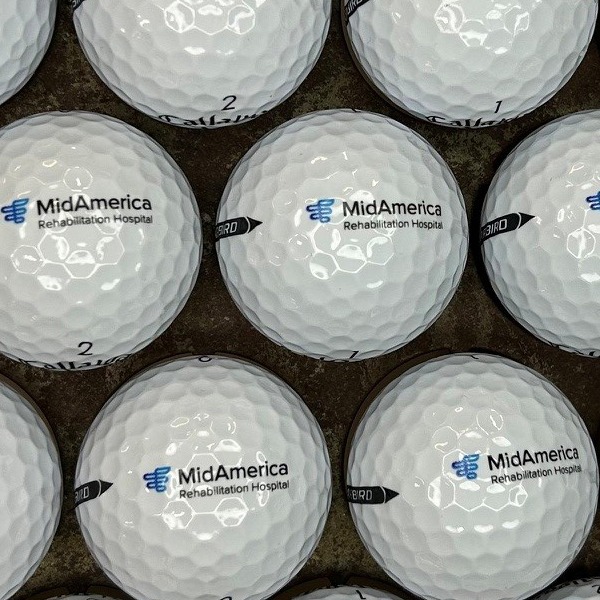 Callaway golf balls printed with a blue hospital logo