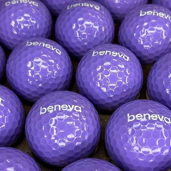 Purple custom golf balls printed with a white logo
