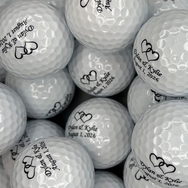 Personalized wedding golf balls printed with names and a wedding date