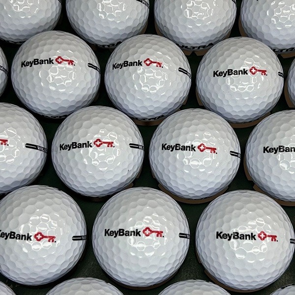 Custom logo golf balls printed with red and black company branding