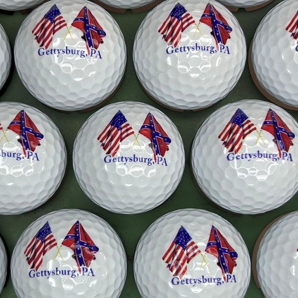 Custom golf balls featuring a patriotic city and state design