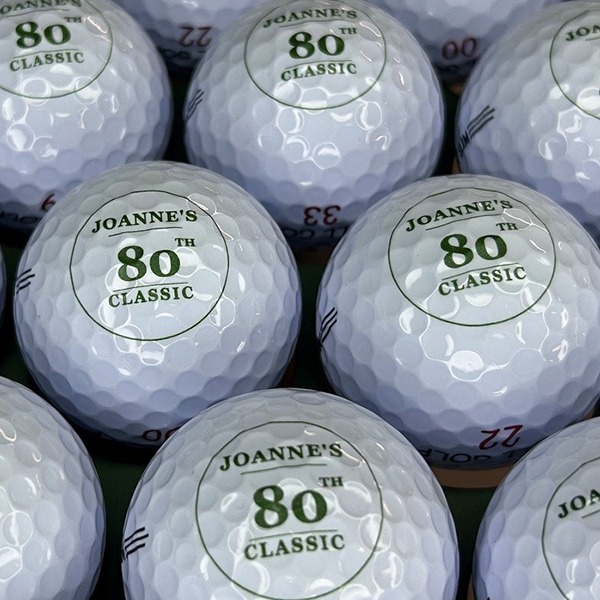 Personalized golf balls printed for an 80th birthday golf event