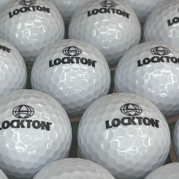 Logo golf balls printed with a custom black company design