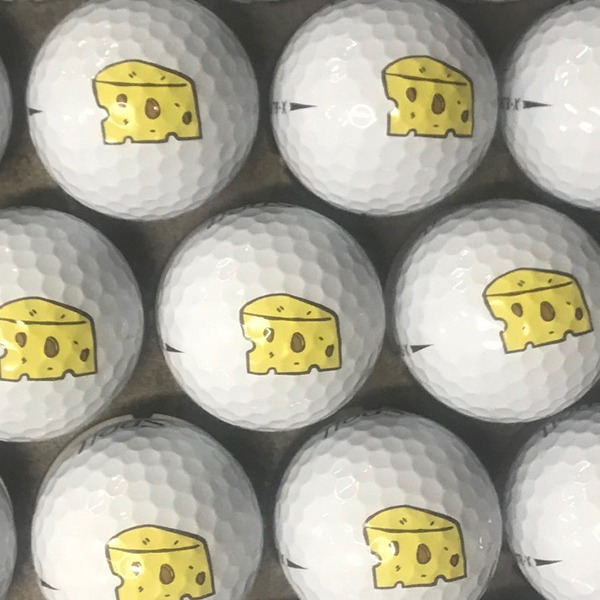 Logo golf balls featuring a custom yellow illustrated design