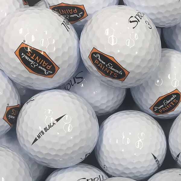 Custom logo golf balls featuring a full-color printed design