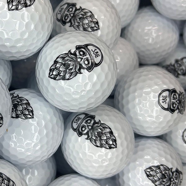Custom golf balls printed with detailed black logo artwork