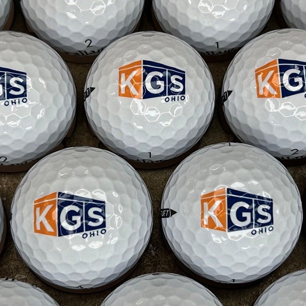 Custom logo golf balls printed with an orange and blue design