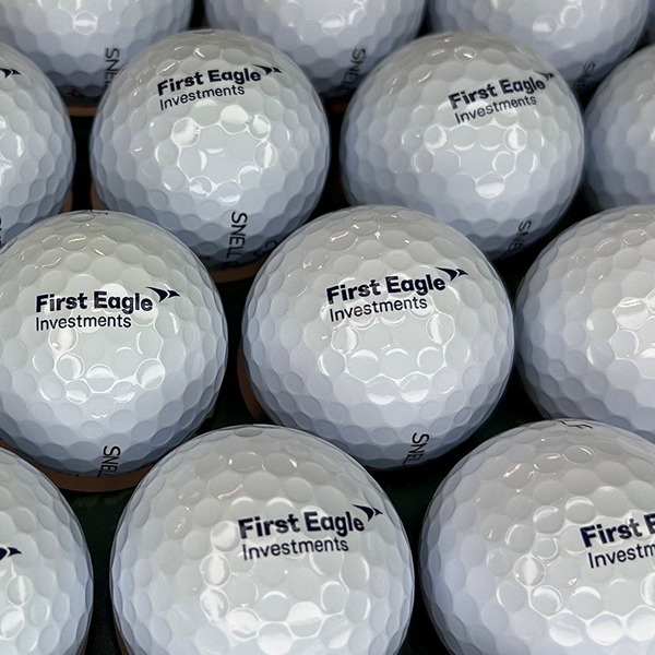 Custom golf balls featuring black company logo printing