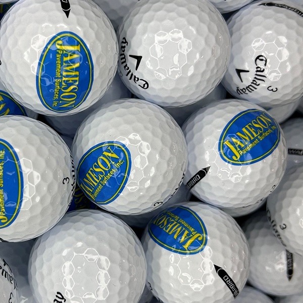 Custom logo golf balls featuring a blue and yellow oval design
