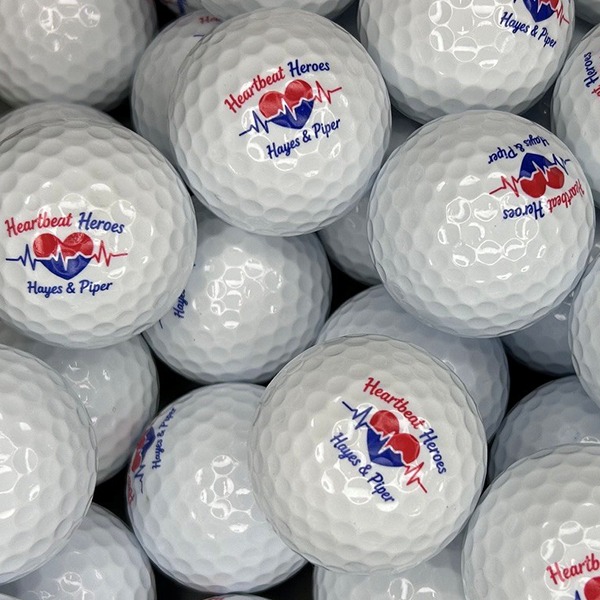 Personalized memorial golf balls printed in remembrance of a loved one