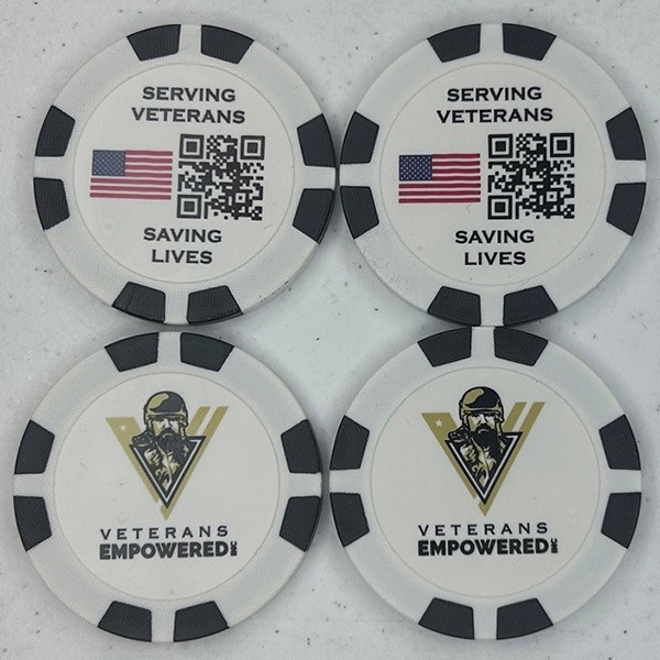 Promotional poker chips featuring patriotic and veterans event designs