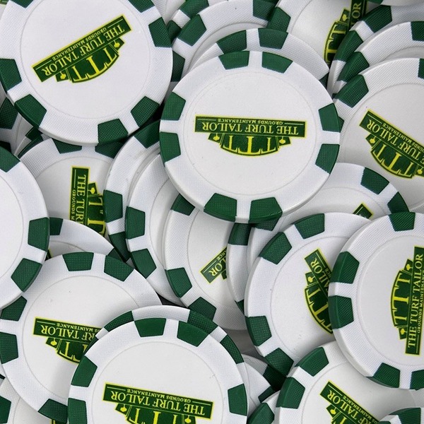 Green and white promotional poker chips featuring a custom logo design