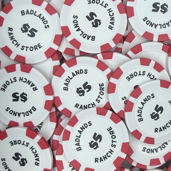 Red custom poker chips printed with black lettering