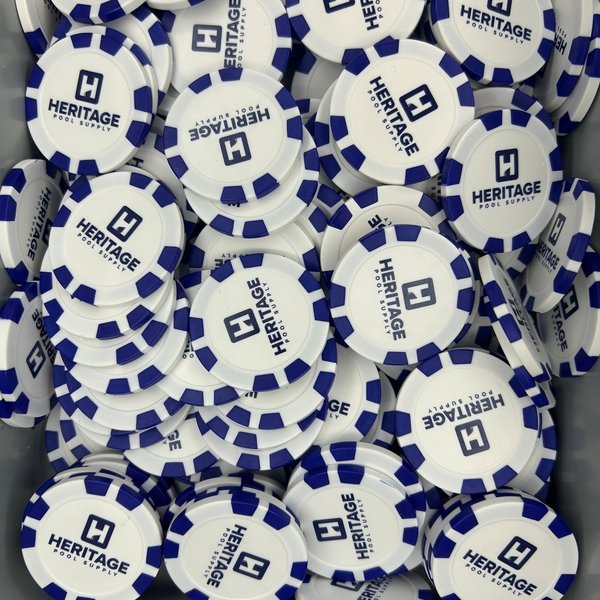 Navy and white promotional poker chips printed with a company logo