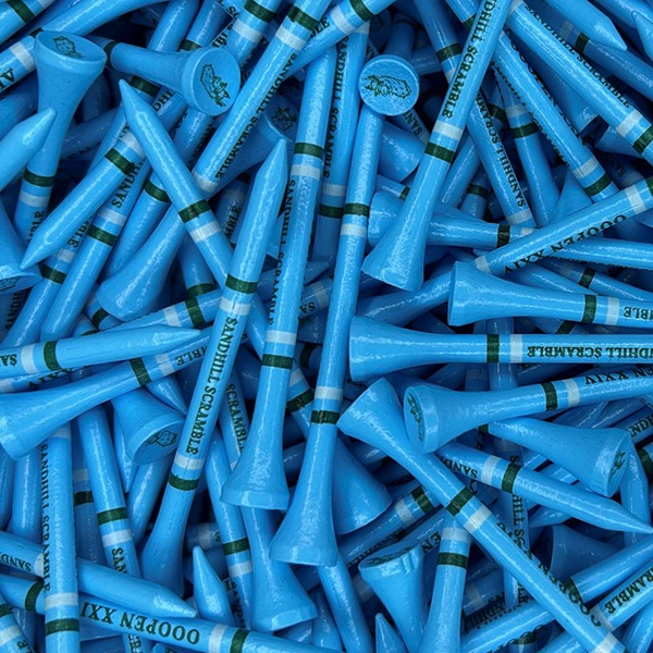 Blue custom golf tees with green stripes for a golf tournament